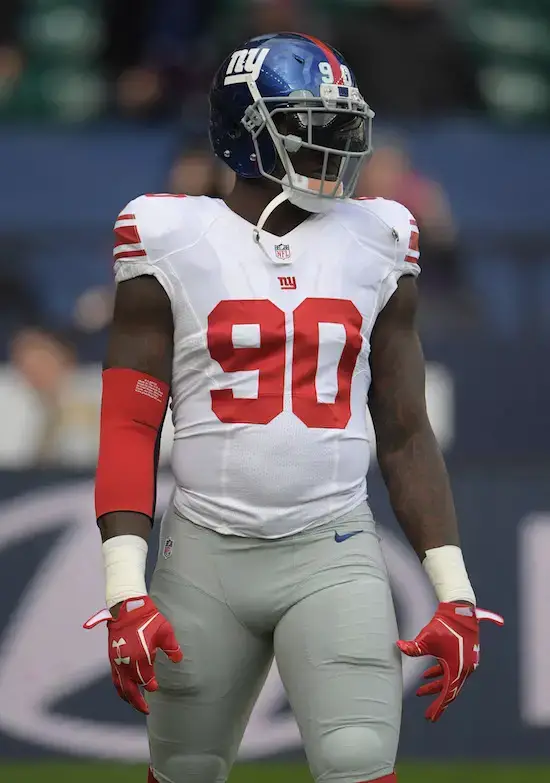 Victor Cruz back at practice, wearing protective red jersey