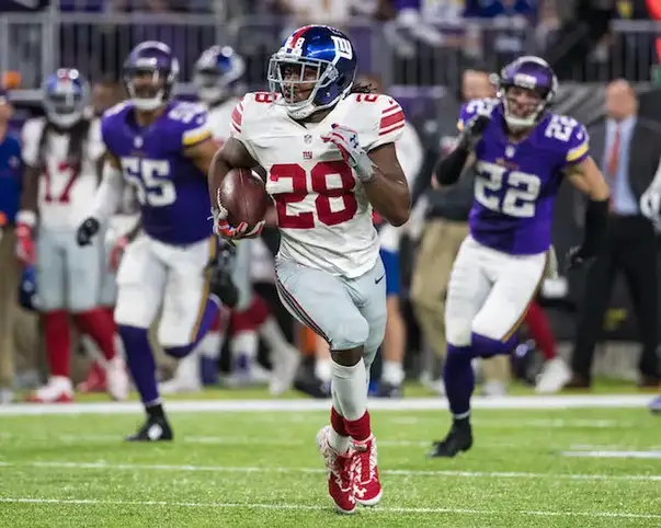 Fullback Don Perkins (43) runs against the then brand new