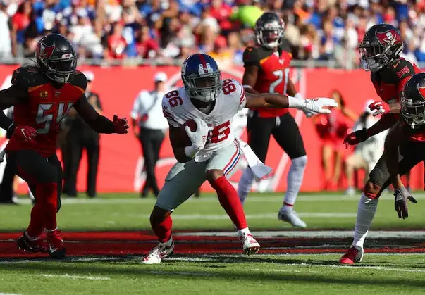 Giants running back Saquon Barkley practices on a limited basis with his  sprained right ankle, Tampa Bay Buccaneers