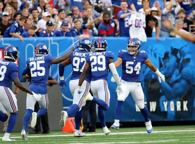 New York Giants running back Sandro Platzgummer (34) reacts after