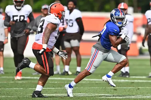 Giants' Saquon Barkley makes fan's summer after responding to desperate  sign at training camp