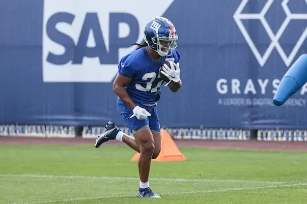 Giants' Saquon Barkley makes fan's summer after responding to desperate  sign at training camp