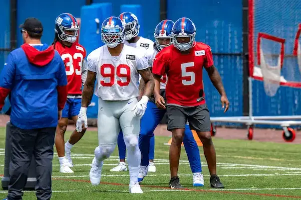 EAST RUTHERFORD, NJ - AUGUST 28: New York Giants safety Yusuf Corker (21)  runs down field during the second quarter of the National Football League  game between the New York Jets and