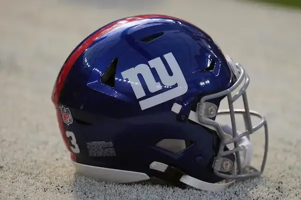 A New York Giants helmet is seen on the field before an NFL